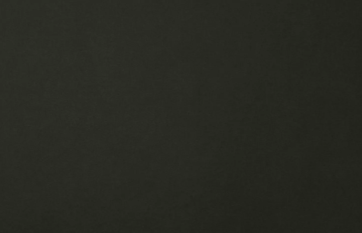 Carnabie U Shaped fabric corner sofa with footstool, black, modern design, cushioned seating.