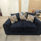 Navy blue Lounger Fabric Sofa 2 seater with patterned cushions in a room setting.