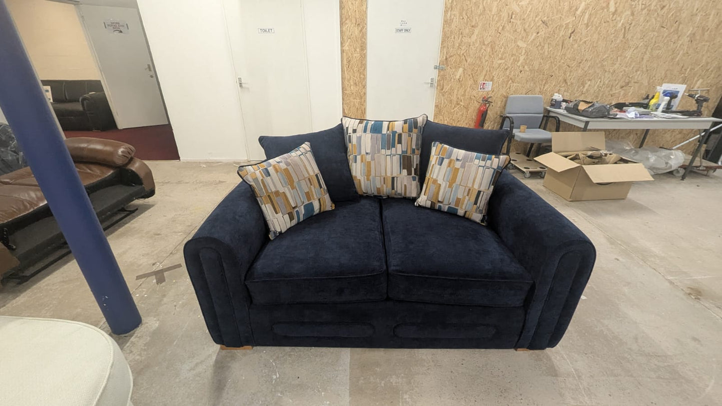 Navy blue Lounger Fabric Sofa 2 seater with patterned cushions in a room setting.