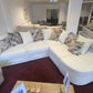 Lounger fabric sofa right hand corner cream beige with scatter back cushions in showroom.