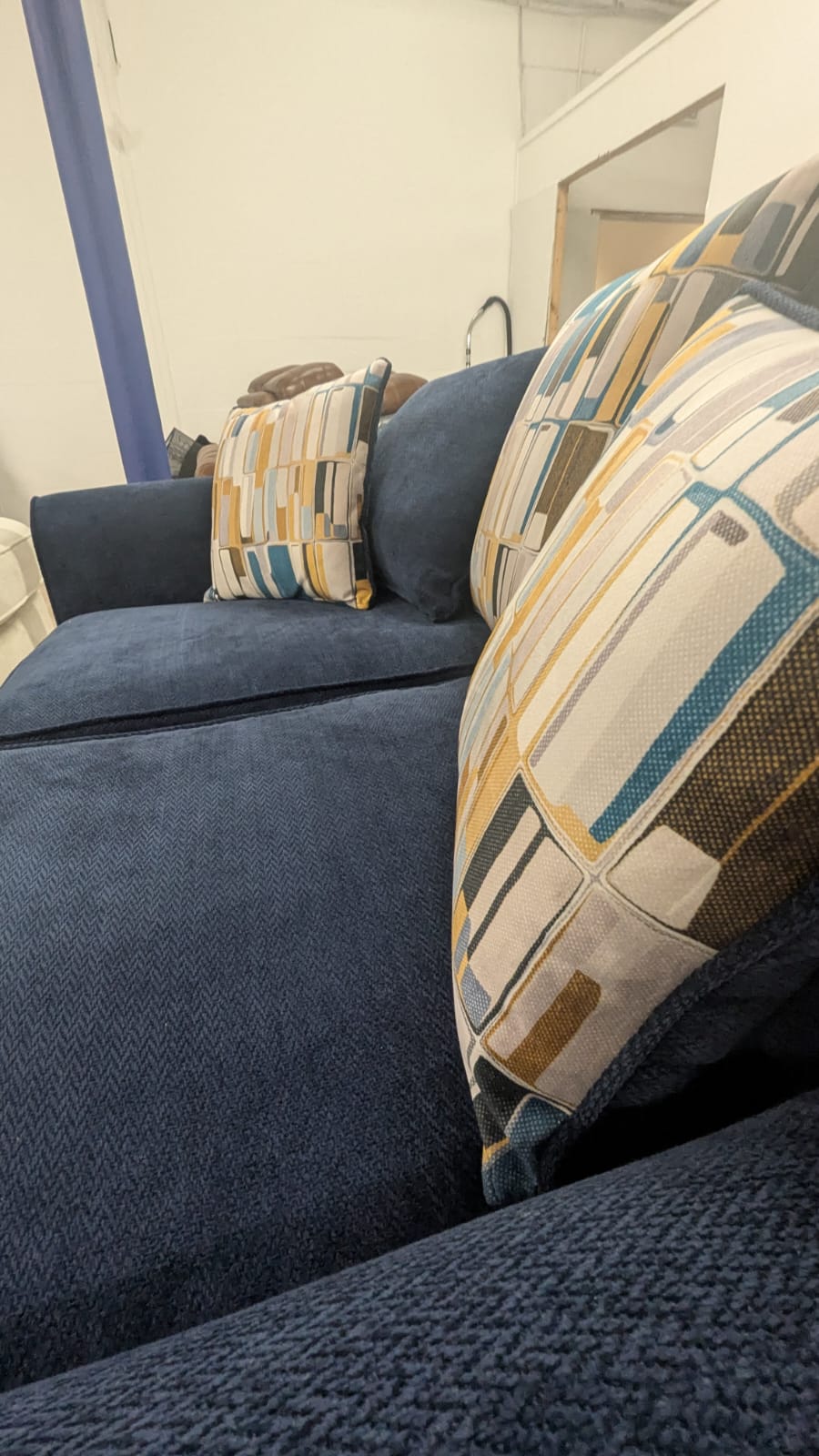 Lounger Fabric Sofa 2 Seater in Navy Blue with patterned cushions, offering ultimate comfort and style.