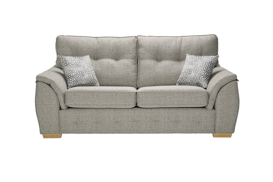 Ashley Fabric Corner Collection sofa with buttoned back cushions and cushioned armrests.