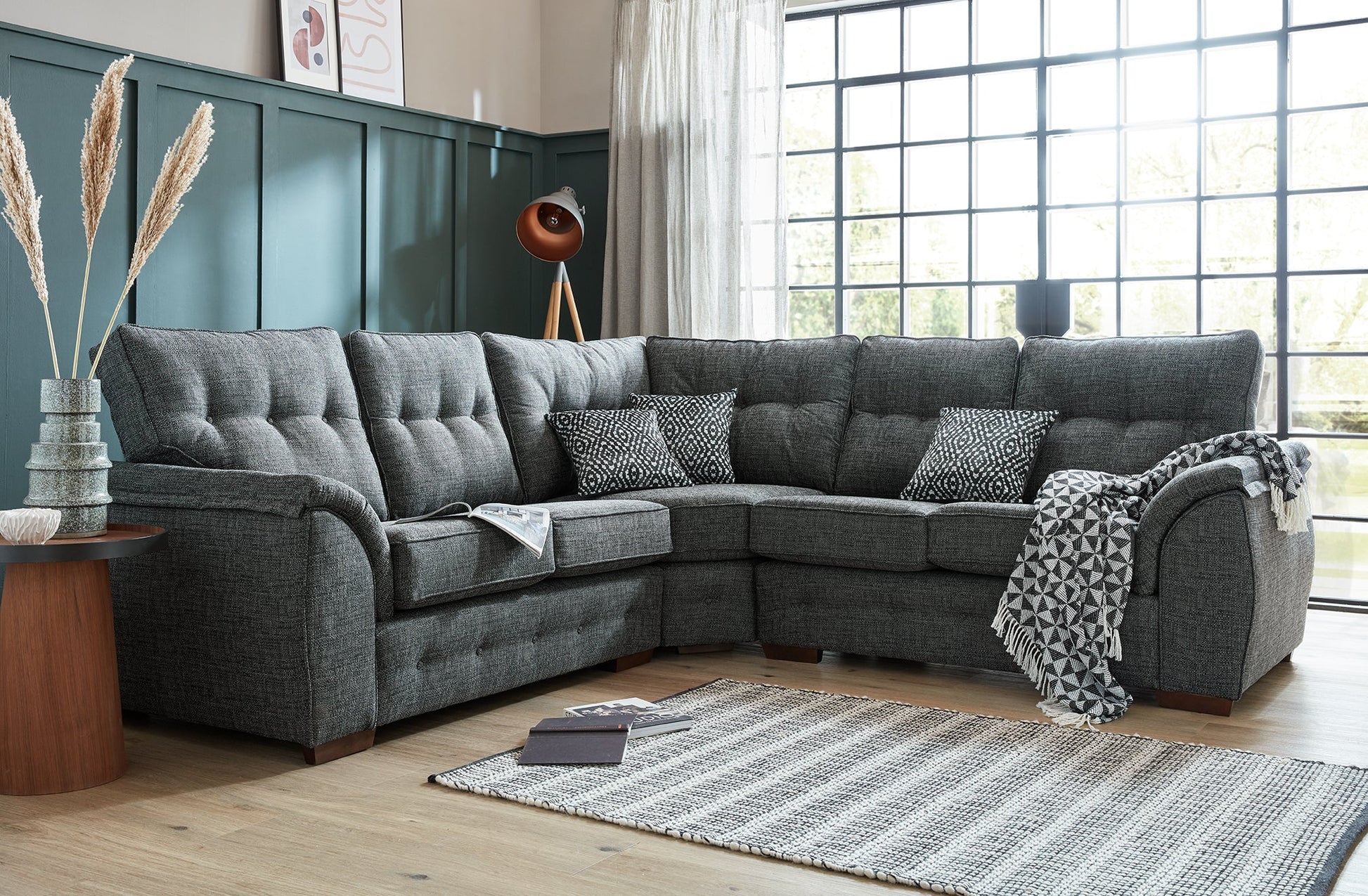 Ashley Fabric Corner Collection in a modern living room, featuring plush seating and elegant design.