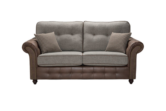 Barcelona Two Tone Corner Sofa with leather and fabric design, featuring buttons and studs for added character.