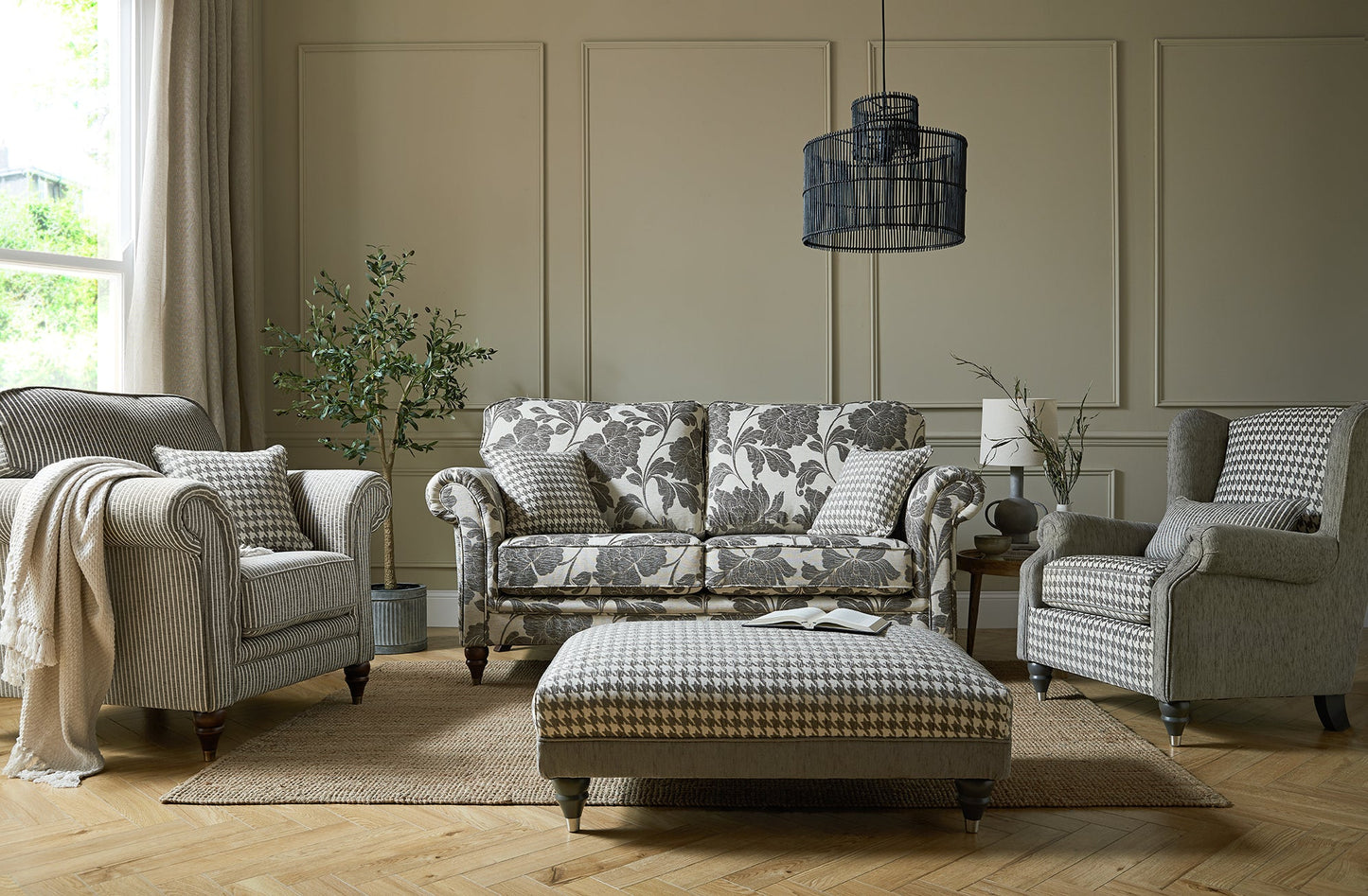 Cambridge Fabric Sofa Collection in elegant living room with houndstooth and pinstripe designs.