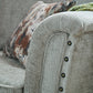 Carrington Fabric Sofa Collection with hand-studded arm detail and textured cushions.