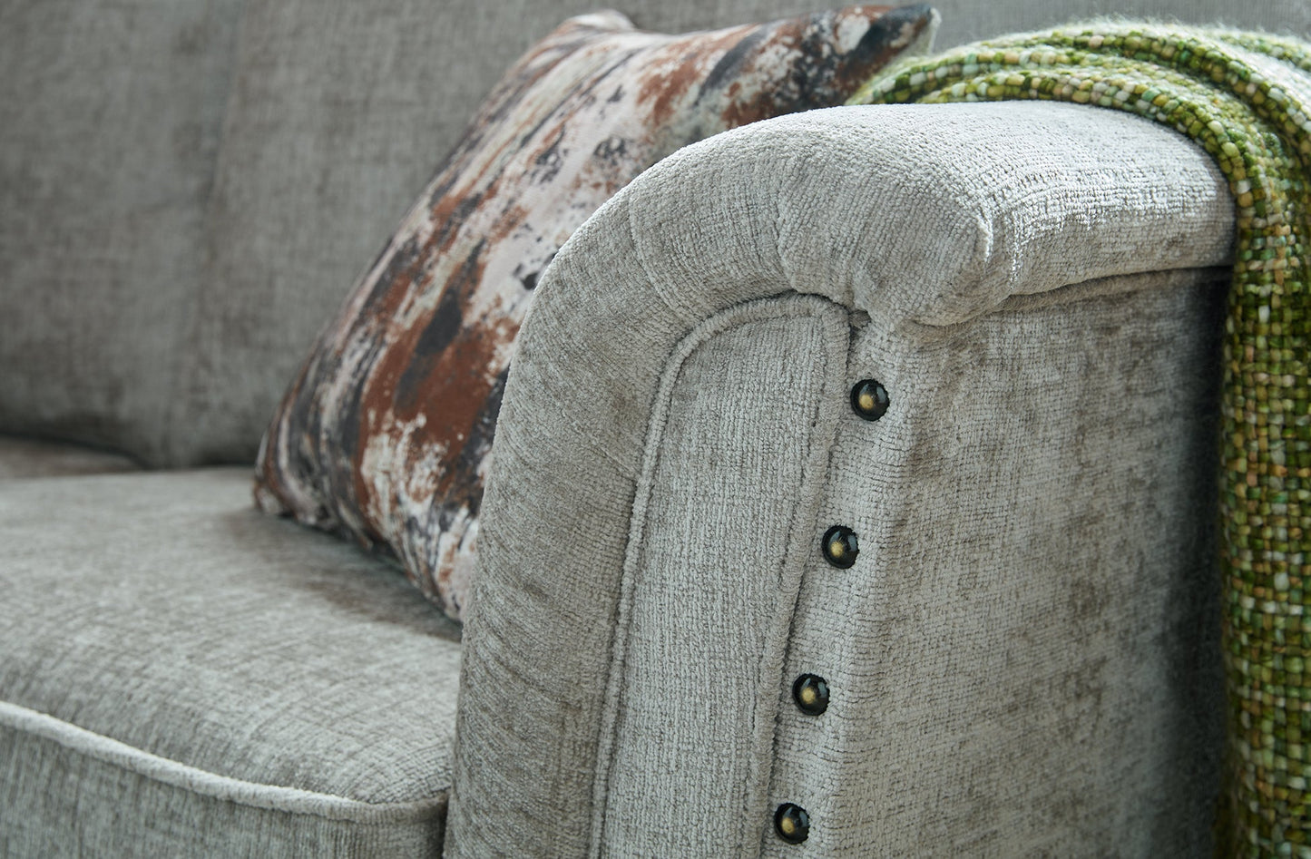 Carrington Fabric Sofa Collection with hand-studded arm detail and textured cushions.