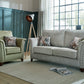 Carrington Fabric Sofa Collection in elegant setting with handcrafted stud detailing.