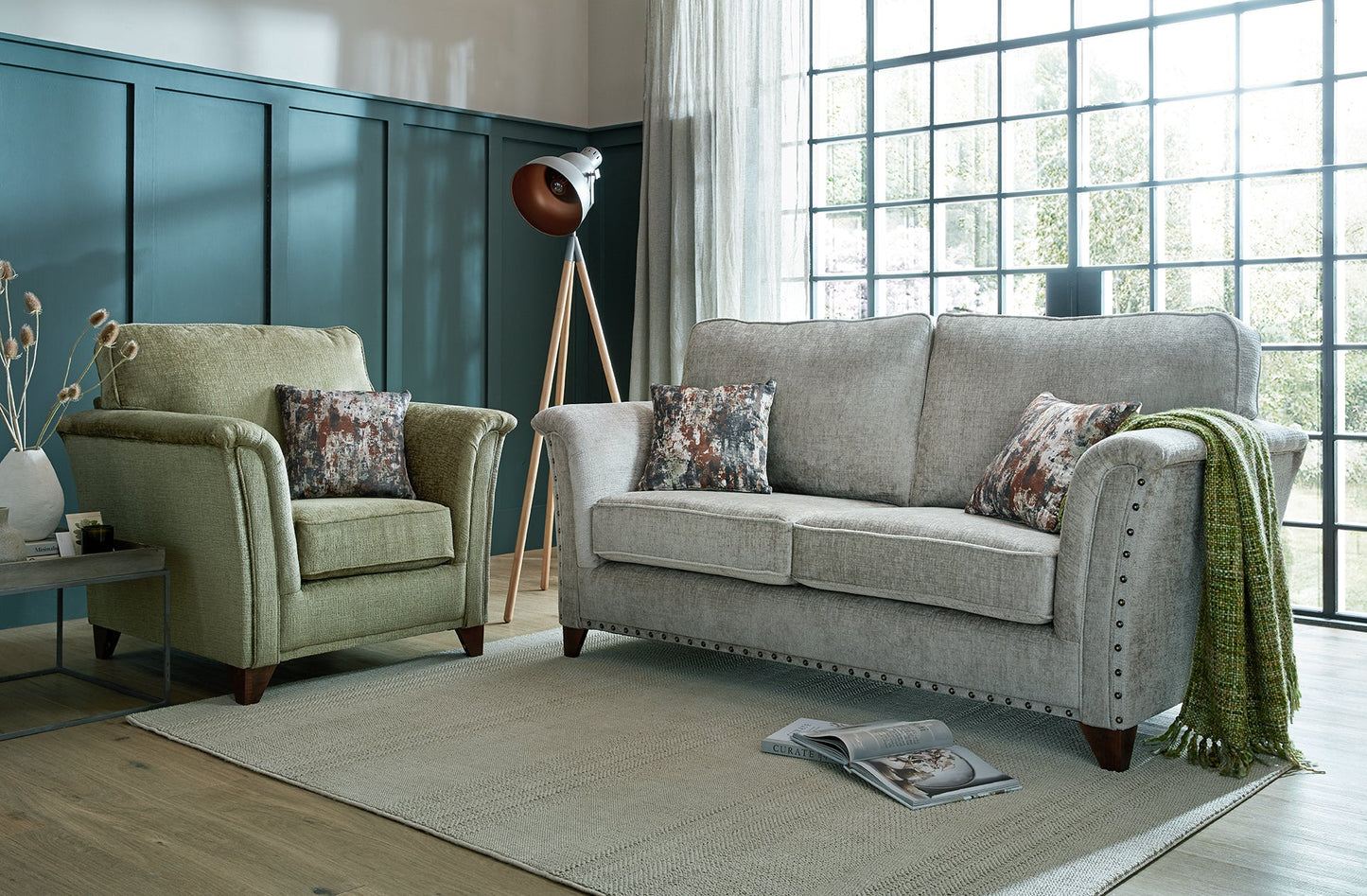 Carrington Fabric Sofa Collection in elegant setting with handcrafted stud detailing.