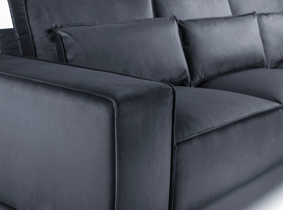 Sloane Fabric Sofa Collection in dark grey velvet, showcasing plush cushions and armrest details.