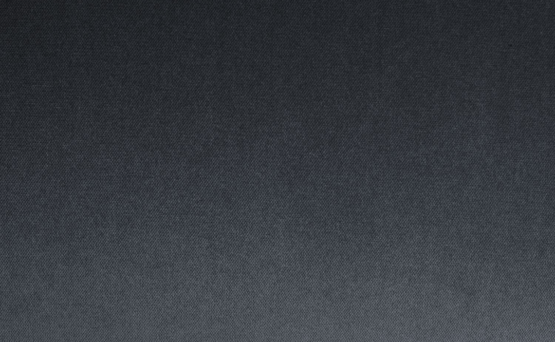 Close-up of black velvet fabric of the Sloane Fabric Sofa Collection.