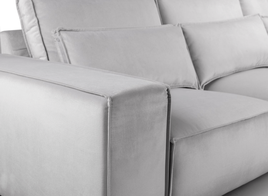 Sloane Fabric Sofa Collection in grey velvet, showcasing plush cushions and robust build.