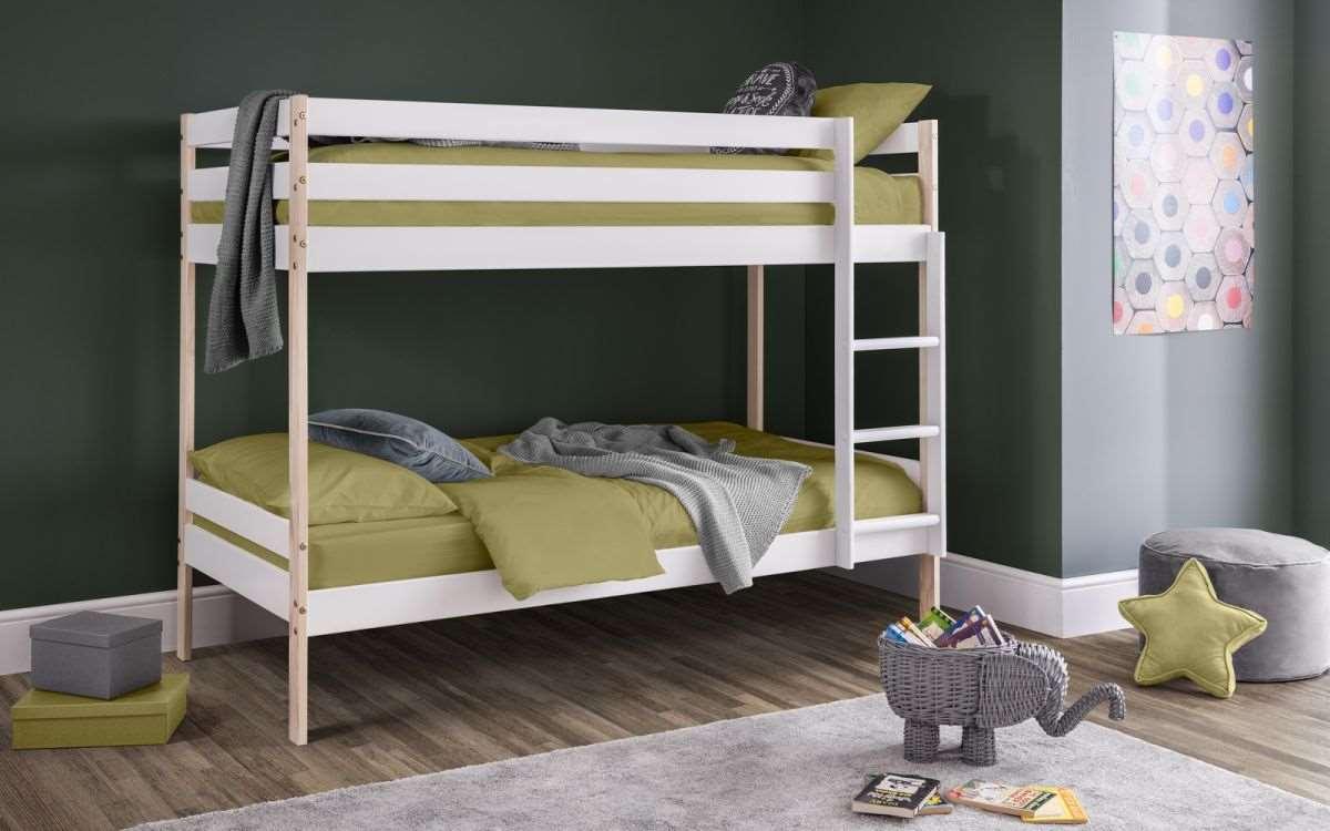 Nova Wooden Bunk Bed in white and pine finish with trundle option in a stylish bedroom setting.