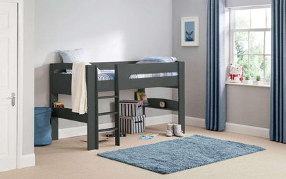 Pluto Midsleeper bed in anthracite finish, children's room setting, blue rug and accessories.