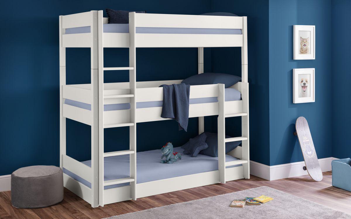 Trio Wooden Bunk Bed in surf white finish, accommodating three children, made of solid pine and MDF, in a stylish bedroom setting.